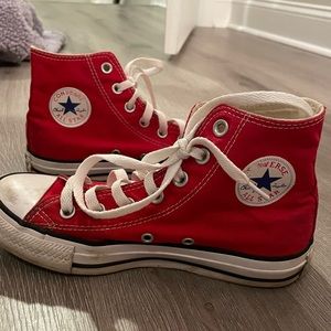 Red converse high top sneakers